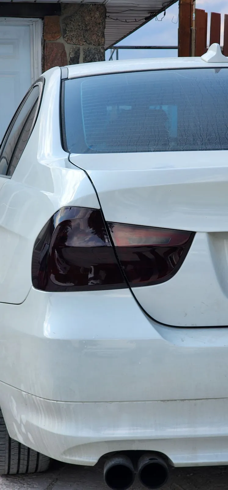 Smoked taillight tint on a white BMW